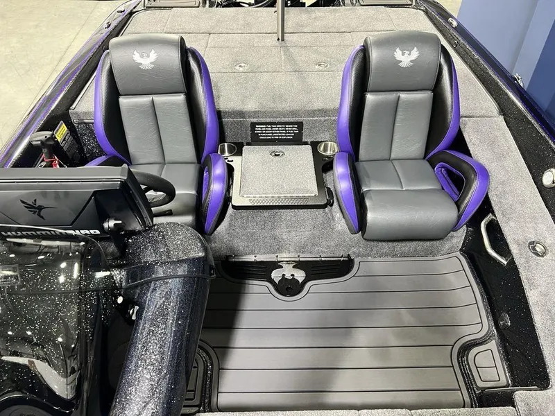 Slide: The Image of 2025 Phoenix 920 Elite boat interior with dual seats and modern dashboard. - 21