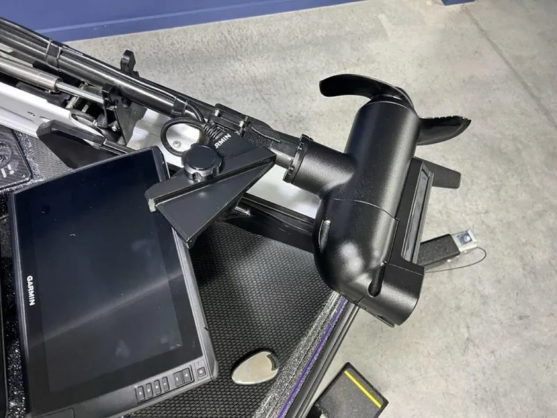 Slide: The Image of Phoenix 920 Elite 2025 boat dashboard with Garmin display and control panel. - 7