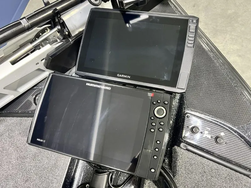 Slide: The Image of Two marine GPS units on a Phoenix 920 Elite boat, 2025 model. - 8