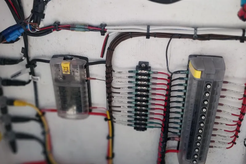 Slide: The Image of Electrical wiring and fuse panel in 2024 Savage Seas Shallow Bay SS22 boat. - 10