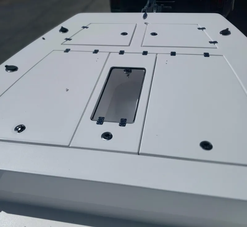 Slide: The Image of 2024 Savage Seas Shallow Bay SS22 boat deck with storage compartments. - 6