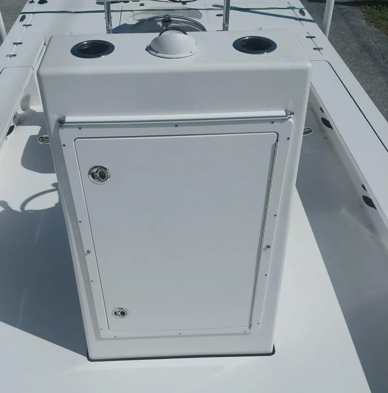 Slide: The Image of 2024 Savage Seas Shallow Bay SS22 boat console with storage compartment. - 9