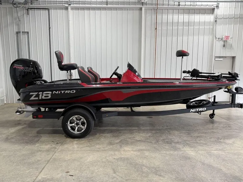 The Image of 2025 Nitro Z18 Pro fishing boat in a showroom, featuring sleek design and modern equipment. - 1