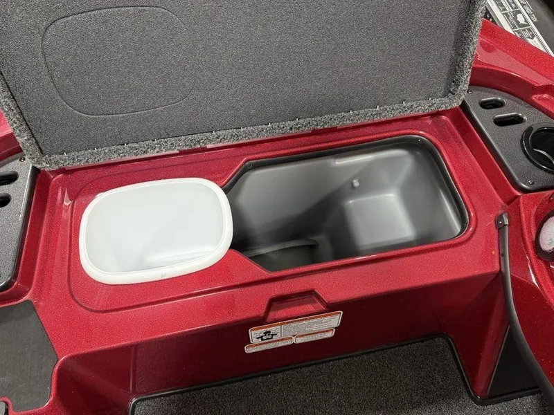 Slide: The Image of Open storage compartment in a 2025 Nitro Z18 Pro boat. - 12