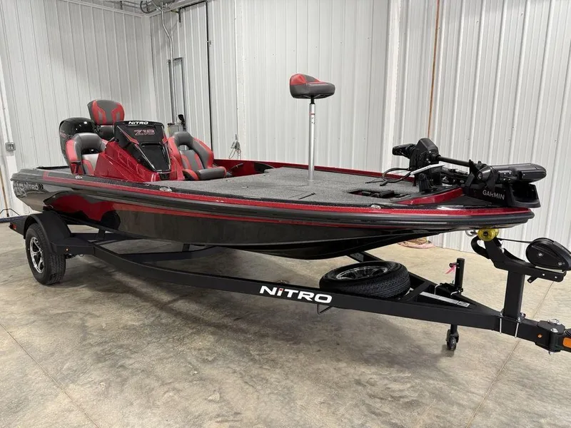 Slide: The Image of 2025 Nitro Z18 Pro fishing boat in a garage, featuring sleek design and modern equipment. - 3