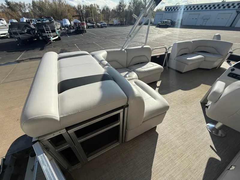 Slide: The Image of 2018 Landau Island Breeze 212C pontoon boat with spacious seating and modern design. - 7