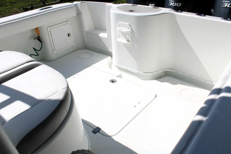 Slide: The Image of 2007 Yellowfin 36 Offshore boat interior with seating and storage compartments. - 10