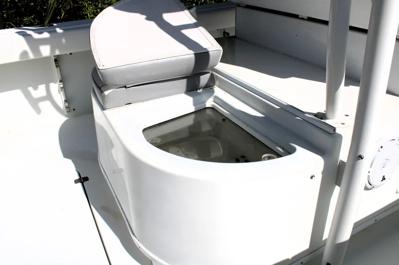 Slide: The Image of 2007 Yellowfin 36 Offshore boat seat with storage compartment. - 13