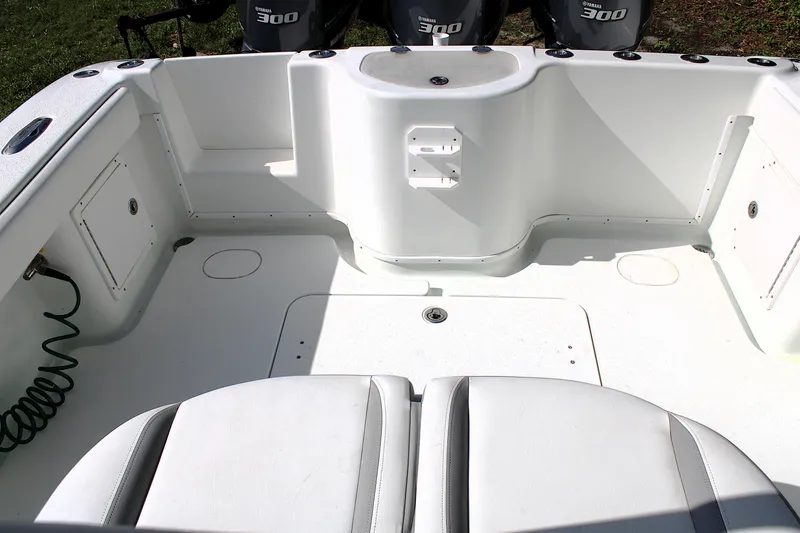 Slide: The Image of 2007 Yellowfin 36 Offshore boat interior with seating and storage compartments. - 14