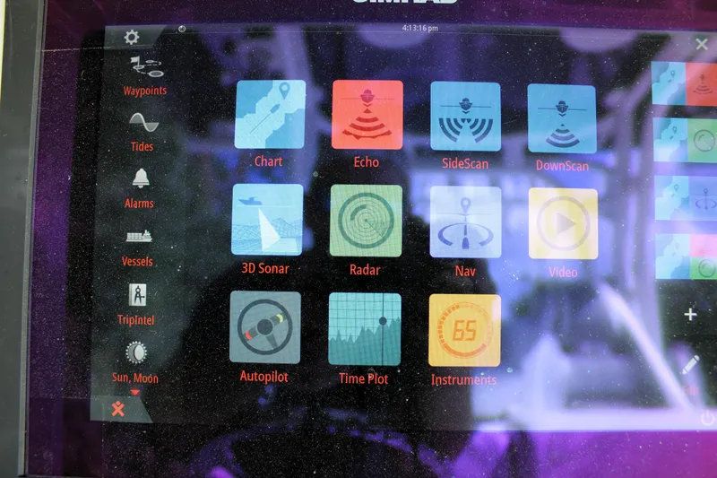 Slide: The Image of Close-up of a 2007 Yellowfin 36 Offshore boat's navigation system display. - 17