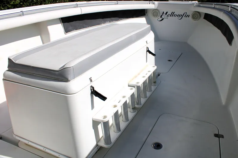Slide: The Image of 2007 Yellowfin 36 Offshore boat interior with seating and rod holders. - 26