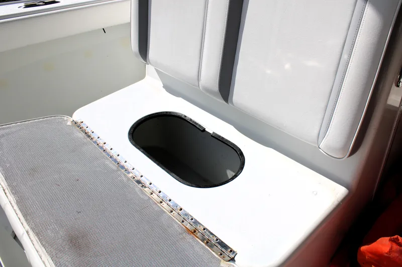 Slide: The Image of 2007 Yellowfin 36 Offshore boat seat with storage compartment. - 32