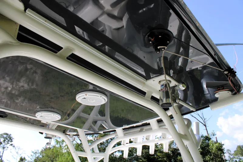 Slide: The Image of 2007 Yellowfin 36 Offshore boat canopy with mounted speakers and rod holders. - 34