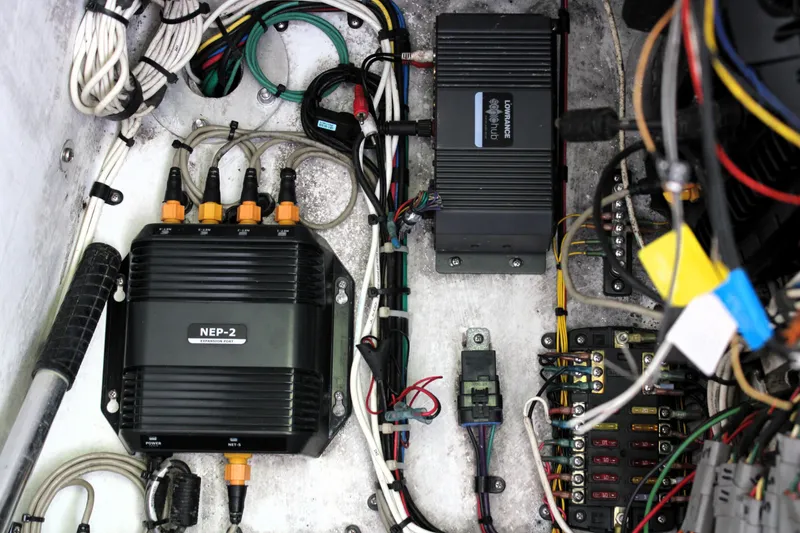 Slide: The Image of Electrical components and wiring inside a 2007 Yellowfin 36 Offshore boat. - 43