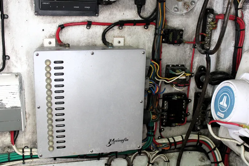 Slide: The Image of Electrical panel and wiring inside a 2007 Yellowfin 36 Offshore boat. - 44
