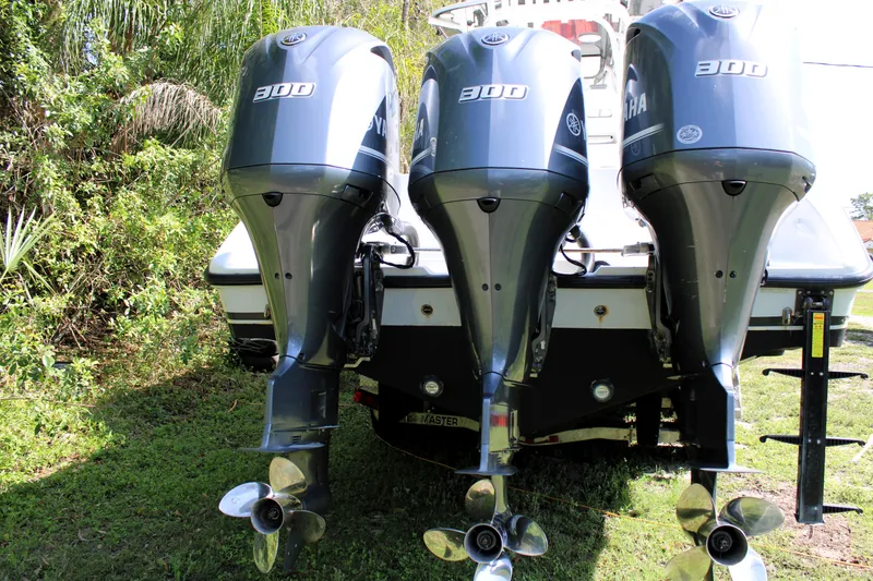 Slide: The Image of 2007 Yellowfin 36 Offshore boat with triple 300 horsepower outboard engines. - 5