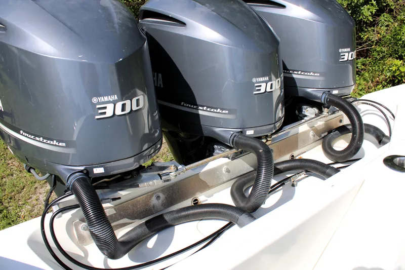 Slide: The Image of Triple Yamaha 300 outboard engines on a 2007 Yellowfin 36 Offshore boat. - 8