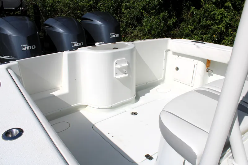 Slide: The Image of 2007 Yellowfin 36 Offshore boat deck with triple 300 horsepower engines. - 9