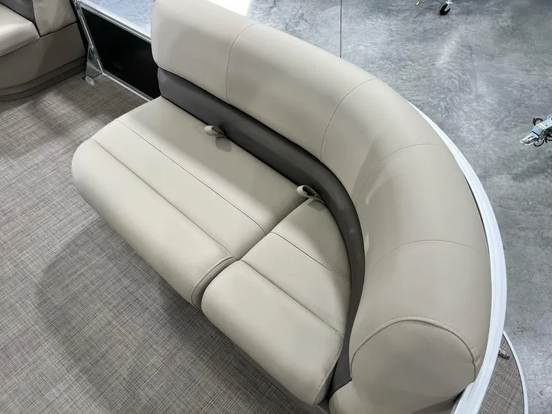 Slide: The Image of 2025 Sun Tracker PARTY BARGE® 16 DLX pontoon boat seating, beige and brown upholstery. - 7
