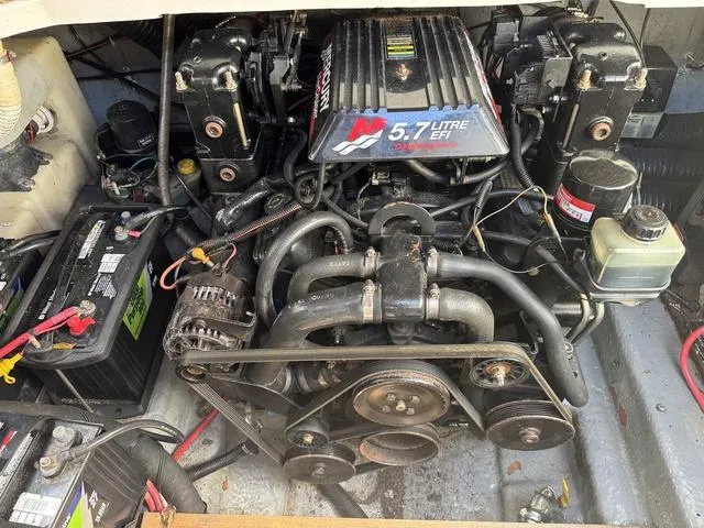 Slide: The Image of Engine compartment of a 2002 Sea Ray 260 Sundancer with 5.7L EFI motor. - 20