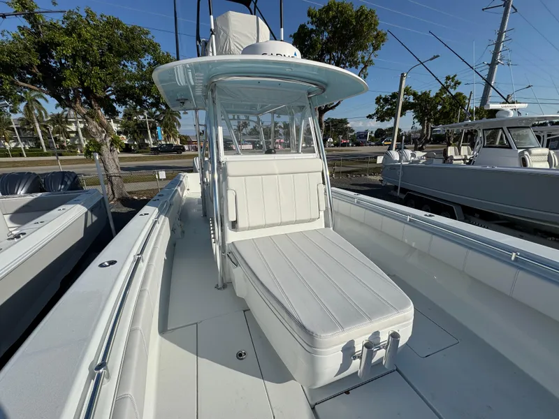 Slide: The Image of 2024 Contender 39 ST boat with sleek design and spacious seating area. - 11