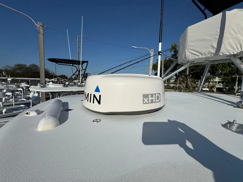 Slide: The Image of 2024 Contender 39 ST boat with Garmin xHD radar on deck. - 25