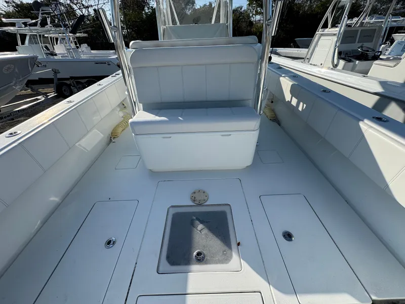 Slide: The Image of 2024 Contender 39 ST boat interior with seating and storage compartments. - 26