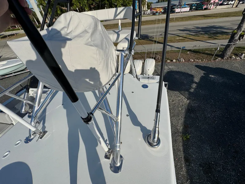 Slide: The Image of 2024 Contender 39 ST boat deck with metal supports and covered seating. - 31