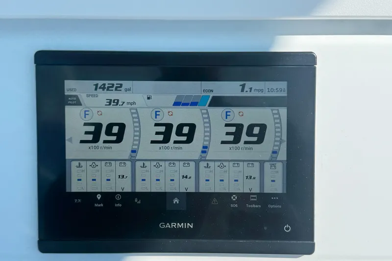 Slide: The Image of Garmin display on 2024 Contender 39 ST showing speed and engine data. - 34