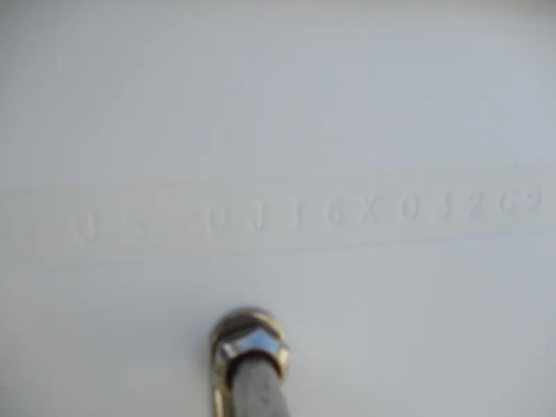 Slide: The Image of 2020 Regulator 26XO boat hull identification number close-up. - 13