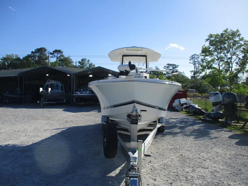 Slide: The Image of 2020 Regulator 26XO boat on trailer in outdoor storage area. - 8