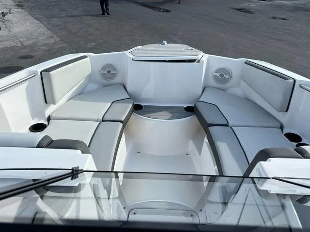 Slide: The Image of 2024 Yamaha Boats SX220 interior with spacious seating and modern design. - 3