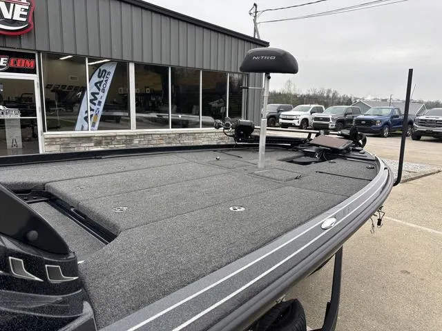 Slide: The Image of 2024 Nitro Z21 XL Pro boat displayed outside a dealership, showcasing its sleek design. - 6