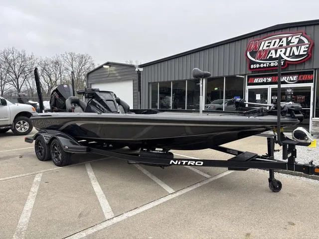 Slide: The Image of 2024 Nitro Z21 XL Pro boat on trailer at dealership parking lot. - 7