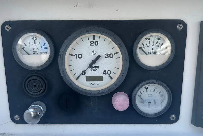 Slide: The Image of Dashboard gauges of a 1980 Morgan 382, displaying RPM, oil, and temperature readings. - 16