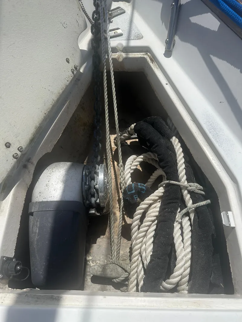 Slide: The Image of Anchor locker of 1980 Morgan 382 sailboat with ropes and winch. - 20