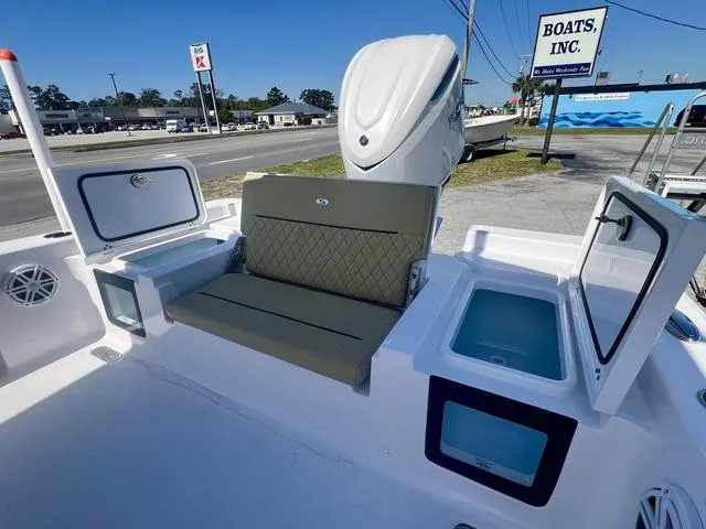 Slide: The Image of 2025 Sportsman Masters 247 boat interior with seating and storage compartments. - 9