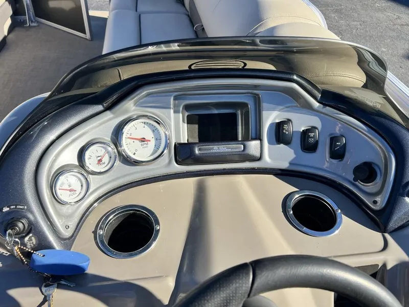 Slide: The Image of Dashboard of 2021 Sun Tracker PARTY BARGE® 20 DLX pontoon boat with gauges and controls. - 18