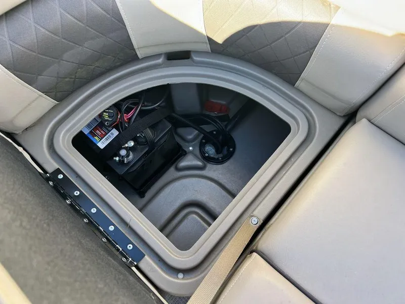 Slide: The Image of 2021 Sun Tracker PARTY BARGE® 20 DLX storage compartment with battery and wiring. - 21