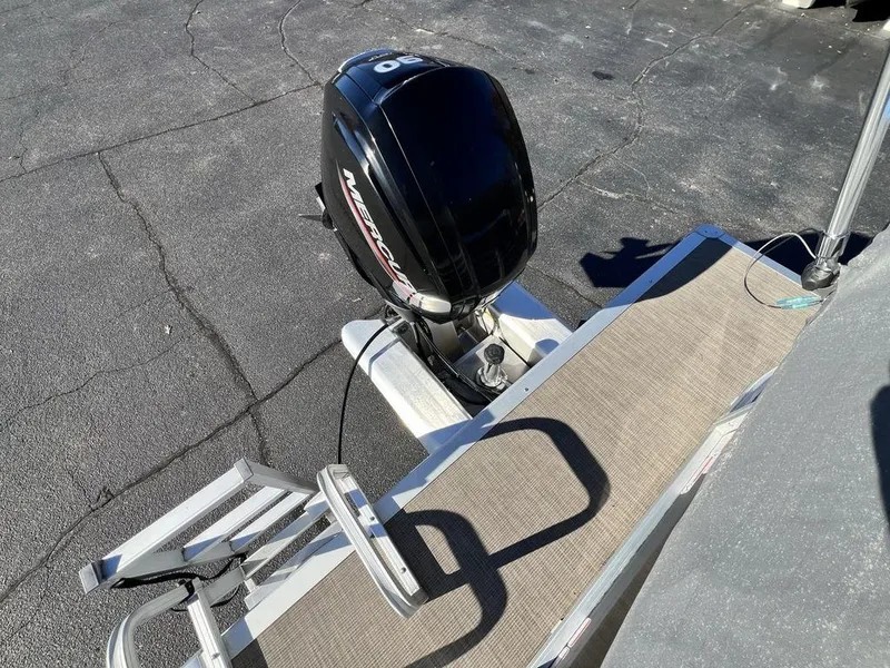 Slide: The Image of 2021 Sun Tracker PARTY BARGE® 20 DLX with Mercury outboard motor and swim ladder. - 23