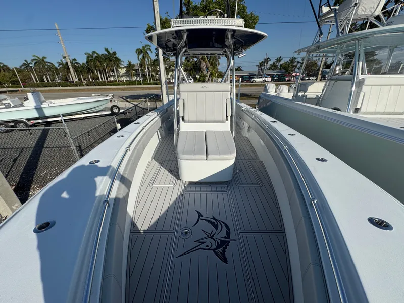 Slide: The Image of 2023 Contender 32 ST boat with spacious deck and marlin design flooring. - 38