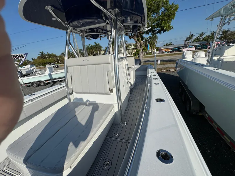 Slide: The Image of 2023 Contender 32 ST boat with sleek design and spacious deck. - 41