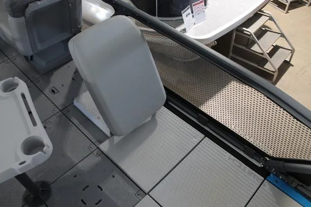 Slide: The Image of 2022 Sea-Doo Switch® Sport 18 interior with seating and deck details. - 10