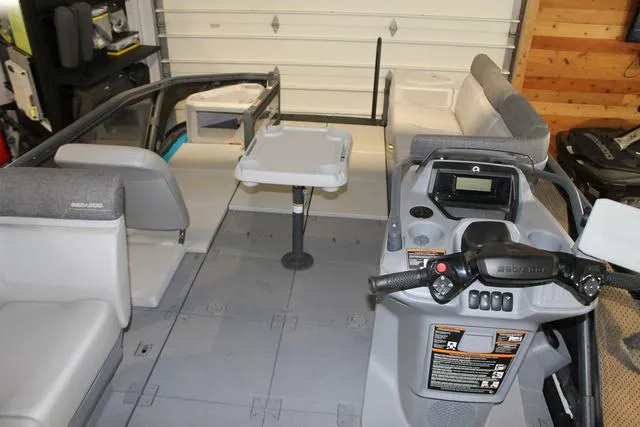 Slide: The Image of 2022 Sea-Doo Switch® Sport 18 interior with steering console and seating. - 6