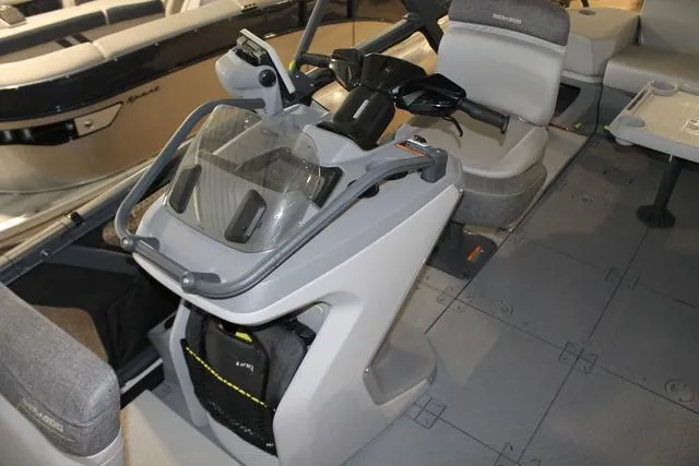 Slide: The Image of 2022 Sea-Doo Switch Sport 18 interior with steering console and seating. - 9