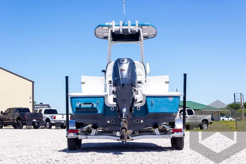 Slide: The Image of 2025 Tidewater 2110 Bay Max boat on trailer, rear view, outdoors. - 14