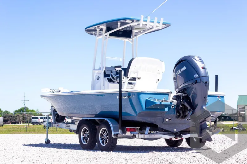 Slide: The Image of 2025 Tidewater 2110 Bay Max boat on trailer, featuring Yamaha outboard motor. - 15