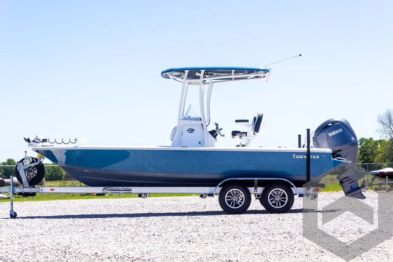 Slide: The Image of 2025 Tidewater 2110 Bay Max boat on trailer, side view, outdoors. - 16