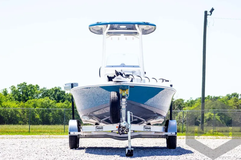 Slide: The Image of 2025 Tidewater 2110 Bay Max boat on trailer, front view, outdoors. - 2