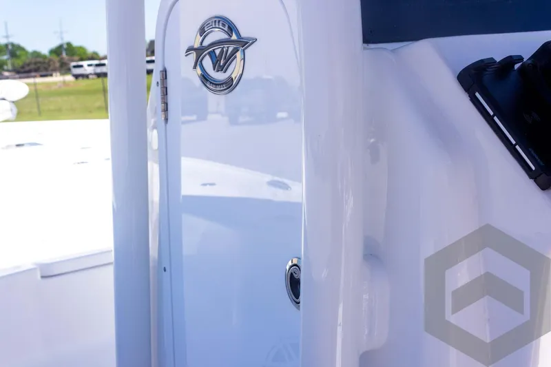 Slide: The Image of 2025 Tidewater 2110 Bay Max boat detail with logo, showcasing sleek design and craftsmanship. - 34